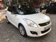 Suzuki Swift AT  2015 - Cần bán gấp Suzuki Swift AT sản xuất năm 2015, màu trắng số tự động