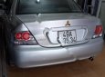 Mitsubishi Lancer 2004 - Cần bán lại xe Mitsubishi Lancer 2004, màu bạc số tự động, giá tốt