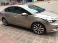 Kia K3 2015 - Cần bán lại xe Kia K3 đời 2015, màu vàng