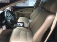 Toyota Camry 2.0E 2013 - Cần bán lại xe Toyota Camry 2.0E năm 2013, màu đen còn mới