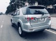 Toyota Fortuner V 2014 - Gia đình bán chiếc Fortuner 2.7V đời 2014, xe 1 chủ gia đình mua từ mới tinh