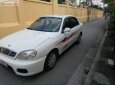 Daewoo Lanos SX 2004 - Gia đình cần bán Daewoo Lanos SX đời 2004, màu trắng, giá 72tr