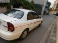 Daewoo Lanos SX 2004 - Gia đình cần bán Daewoo Lanos SX đời 2004, màu trắng, giá 72tr