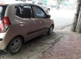 Hyundai i10 2010 - Cần bán Hyundai i10 năm sản xuất 2010, màu vàng cát