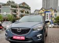 Mazda CX 5 AT 2009 - Cần bán lại xe Mazda CX 5 AT 2009, màu xanh lam, số tự động