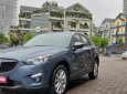 Mazda CX 5 AT 2009 - Cần bán lại xe Mazda CX 5 AT 2009, màu xanh lam, số tự động