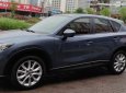 Mazda CX 5 AT 2009 - Cần bán lại xe Mazda CX 5 AT 2009, màu xanh lam, số tự động