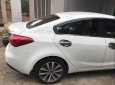 Kia K3 1.6 MT 2015 - Cần bán Kia K3 1.6 MT đời 2015, màu trắng giá cạnh tranh