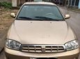 Kia Spectra   2004 - Cần bán lại xe Kia Spectra năm sản xuất 2004, màu vàng