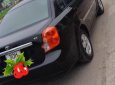 Daewoo Lacetti EX 2010 - Cần bán lại xe Daewoo Lacetti EX 2010, màu đen, xe gia đình