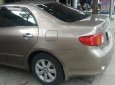 Toyota Corolla altis G 2010 - Bán ô tô Toyota Corolla altis G sản xuất năm 2010, màu vàng