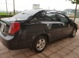 Chevrolet Lacetti EX 2010 - Bán Chevrolet Lacetti EX 2010, màu đen, xe gia đình 