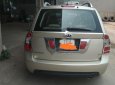 Kia Carens SXMT 2011 - Cần bán xe Kia Carens bản đầy đủ, màu ghi vàng, số sàn, cửa sổ trời