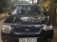 Ford Escape MT 2004 - Cần bán Ford Escape MT 2004, màu đen, xe đi giữ, chăm sóc tốt, gầm cao máy khỏe