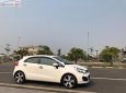 Kia Rio 1.4 AT 2014 - Bán xe Kia Rio nhập khẩu Hàn Quốc đời 2014, số tự động, máy xăng, màu trắng, nội thất màu kem