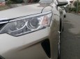 Toyota Camry 2.0E 2015 - Bán xe cũ Toyota Camry 2.0E 2015, màu vàng xe gia đình