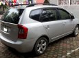 Kia Carens LX 2010 - Bán xe Kia Carens LX đời 2010, màu bạc, xe gia đình