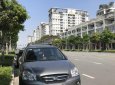 Kia Carens EX 2010 - Cần bán gấp Kia Carens EX 2010, màu xám