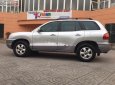 Hyundai Santa Fe Gold  2004 - Bán ô tô Hyundai Santa Fe Gold đời 2004, màu bạc, keo chỉ nguyên zin