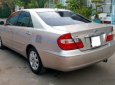 Toyota Camry 3.0 2002 - Cần bán Toyota Camry 3.0 sản xuất 2002, màu vàng giá cạnh tranh