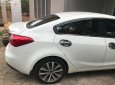 Kia K3 MT 2015 - Cần bán lại xe Kia K3 MT đời 2015, màu trắng xe gia đình, giá 420tr