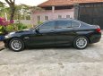 BMW 5 Series 520i 2013 - Cần bán lại xe BMW 520i Series, đăng ký lần đầu 2014, màu đen nhập khẩu nguyên chiếc