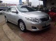 Toyota Corolla altis G MT 2010 - Bán ô tô Toyota Corolla altis G MT 2010, màu bạc xe gia đình