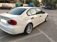 BMW 3 Series 320i 2007 - Cần bán xe BMW 320i 2007 màu trắng, nội thất kem