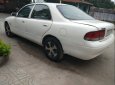 Mazda 626 2000 - Gia đình bán Mazda 626 đời 2000, màu trắng, nhập khẩu Nhật Bản