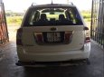 Kia Carens   2010 - Cần bán gấp Kia Carens năm 2010, màu trắng, xe gia đình