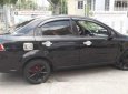 Daewoo Gentra   1.6MT   2011 - Gia đình bán xe Daewoo Gentra 1.6MT sản xuất 2011, màu đen, nhập khẩu