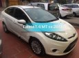 Ford Fiesta 1.4MT 2011 - Cần bán gấp Ford Fiesta 1.4MT đời 2011, màu trắng