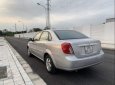 Chevrolet Lacetti 2012 - Cần bán gấp Chevrolet Lacetti năm 2012, màu bạc