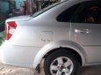 Daewoo Lacetti EX 2009 - Cần bán xe Daewoo Lacetti EX sản xuất năm 2009, màu bạc số sàn