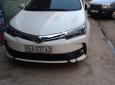 Toyota Corolla altis 1.8E 2017 - Bán xe Toyota Corolla altis 1.8E sản xuất 2017, màu trắng chính chủ, 690 triệu