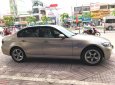 BMW 3 Series  320i 2008 - Gia đình cần bán xe BMW 320i, sản xuất 2008, số tự động, màu vàng cát