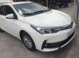 Toyota Corolla altis 1.8E 2017 - Bán xe Toyota Corolla altis 1.8E sản xuất 2017, màu trắng chính chủ, 690 triệu