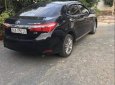 Toyota Corolla altis  MT 2017 - Cần bán gấp Toyota Corolla Altis MT đời 2017, màu đen, xe gia đình sử dụng kĩ nên còn rất đẹp