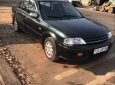 Ford Laser   2001 - Cần bán gấp Ford Laser 2001, màu đen, xe gia đình, 125tr