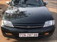 Ford Laser   2001 - Cần bán gấp Ford Laser 2001, màu đen, xe gia đình, 125tr