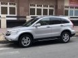 Honda CR V 2010 - Cần bán Honda CR-V 2010 màu bạc, máy xăng AT 2.4L