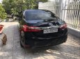 Toyota Corolla altis  MT 2017 - Cần bán gấp Toyota Corolla Altis MT đời 2017, màu đen, xe gia đình sử dụng kĩ nên còn rất đẹp