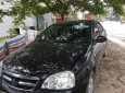 Daewoo Lacetti EX 2010 - Cần bán lại xe Daewoo Lacetti EX sản xuất 2010, màu đen số sàn 