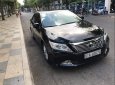 Toyota Camry 2.0E 2012 - Cần bán gấp Toyota Camry 2.0E đời 2012, màu đen