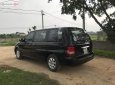 Kia Carnival GS 2.5 AT 2009 - Cần bán xe Kia Carnival GS 2.5 AT năm sản xuất 2009, màu đen, nhập khẩu 