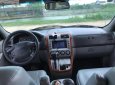 Kia Carnival GS 2.5 AT 2009 - Cần bán xe Kia Carnival GS 2.5 AT năm sản xuất 2009, màu đen, nhập khẩu 