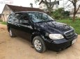 Kia Carnival GS 2.5 AT 2009 - Cần bán xe Kia Carnival GS 2.5 AT năm sản xuất 2009, màu đen, nhập khẩu 