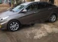 Hyundai Accent 2014 - Bán ô tô Hyundai Accent sản xuất năm 2014, màu nâu chính chủ giá cạnh tranh