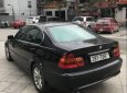 BMW 3 Series 318i 2003 - Bán BMW 3 Series 318i năm 2003, màu đen xe gia đình, giá chỉ 185 triệu