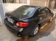 Toyota Corolla altis 1.8MT 2009 - Cần bán lại xe Toyota Corolla altis 1.8MT đời 2009, màu đen số sàn 